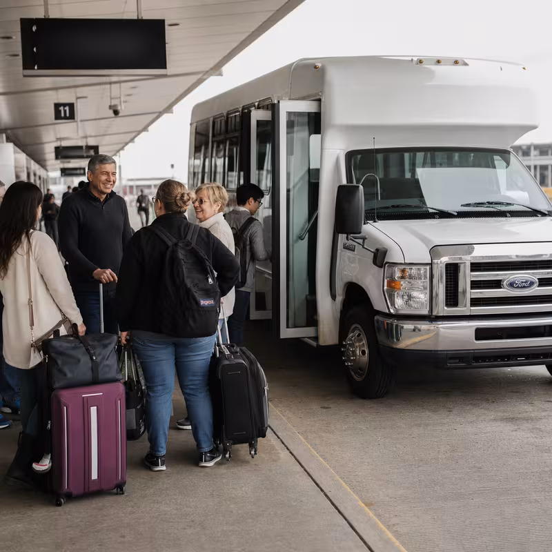 Black Mercedes Sprinter van staged for an Overland Park Airport Transportation group