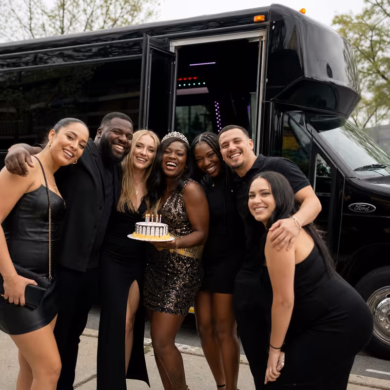 Party bus interior with wraparound leather seating and LED lighting in Overland Park