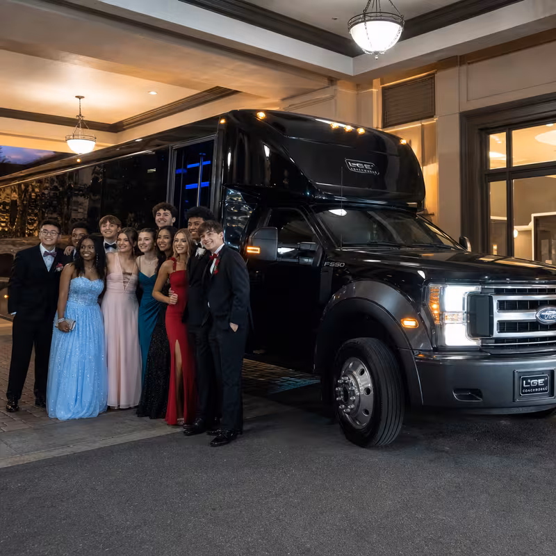Party bus interior with wraparound leather seating and LED lighting in Overland Park