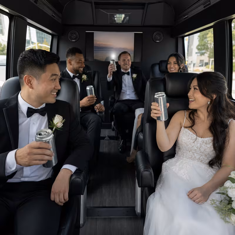 Black Mercedes Sprinter van staged for an Overland Park Wedding Transportation group